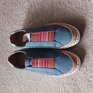 Slip-ons, never worn in size 7, deep blue.
